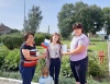Творческие работники сельских учреждений культуры провели акцию "Российский триколор"