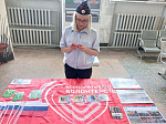 Транспортные полицейские Ртищево провели патриотическую акцию в День Государственного флага